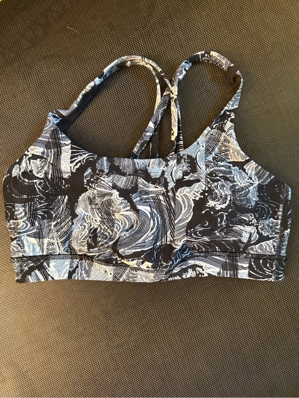Lululemon Energy Bra in a black and blue Eternal Wave pattern